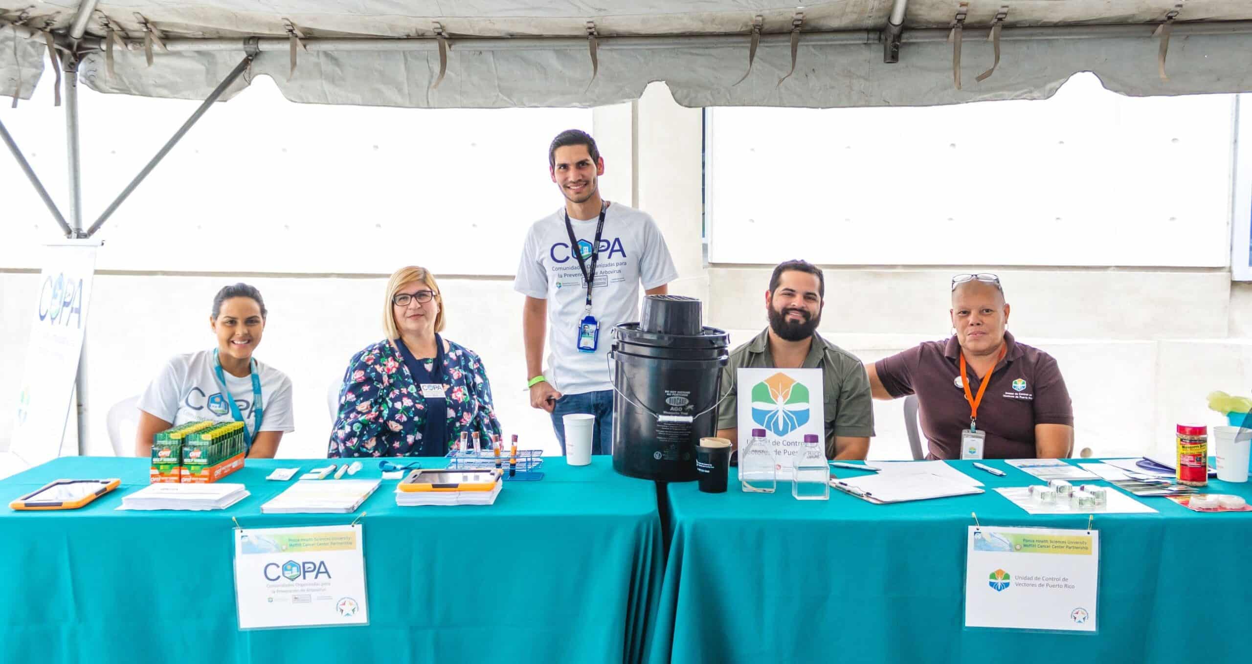 Image of Copa Team at Tables at Event